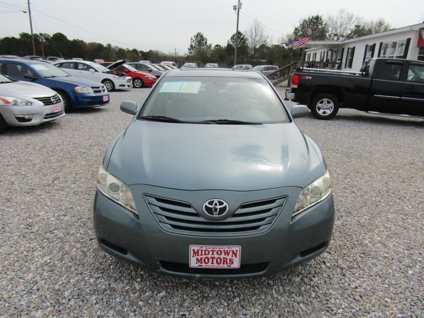 2009 Lt Green /Tan Toyota Camry (4T1BE46K19U) with an 4 Cyl engine, Automatic transmission, located at 15016 S Hwy 231, Midland City, AL, 36350, (334) 983-3001, 31.306210, -85.495277 - Photo#1